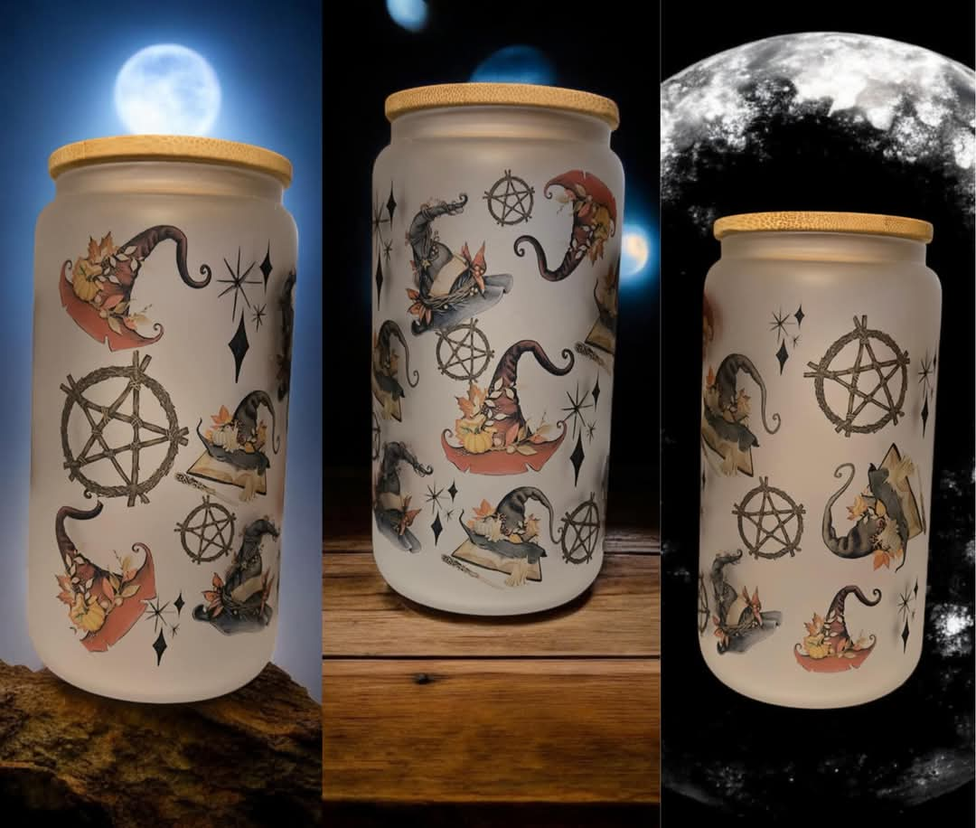 Witchy 16oz frosted glass cup with bamboo lid and a straw.